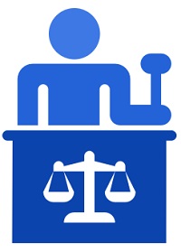 Icon of a judge with a gavel behind a bench with the scales of justice